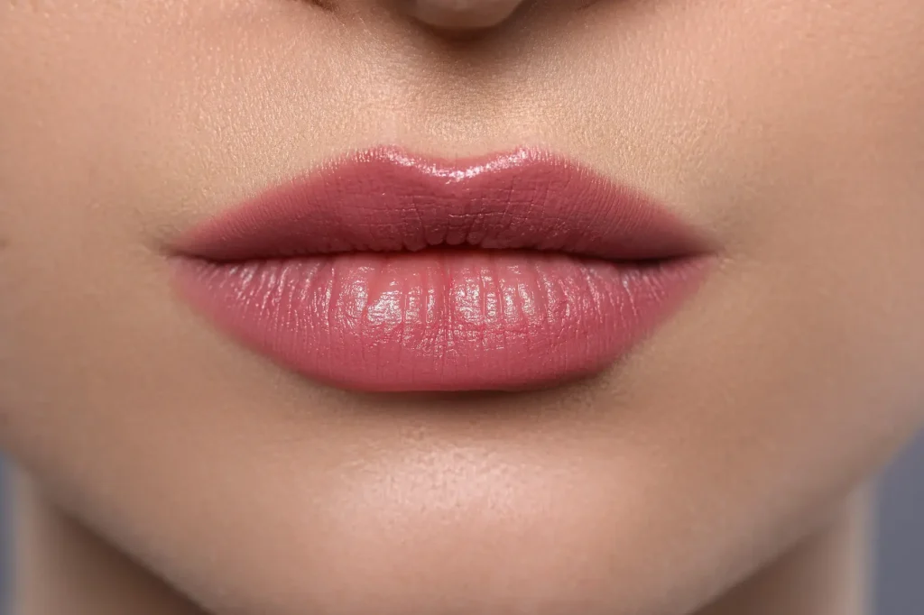 Close-up of a woman’s lips representing communication and allure, used for a blog about multilingual escorts.