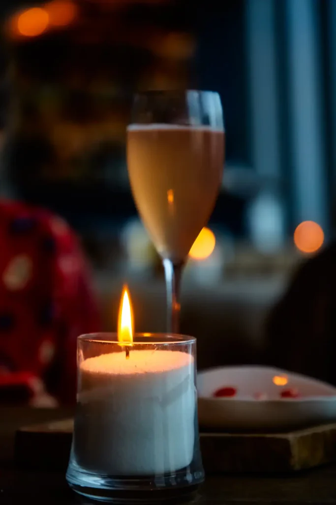 City of London escorts enjoying a candlelit dinner with champagne in a luxury setting