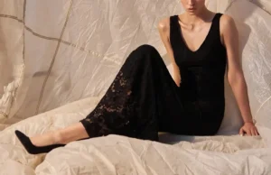 Elegant discreet companion London service provider dressed in a sophisticated black dress.