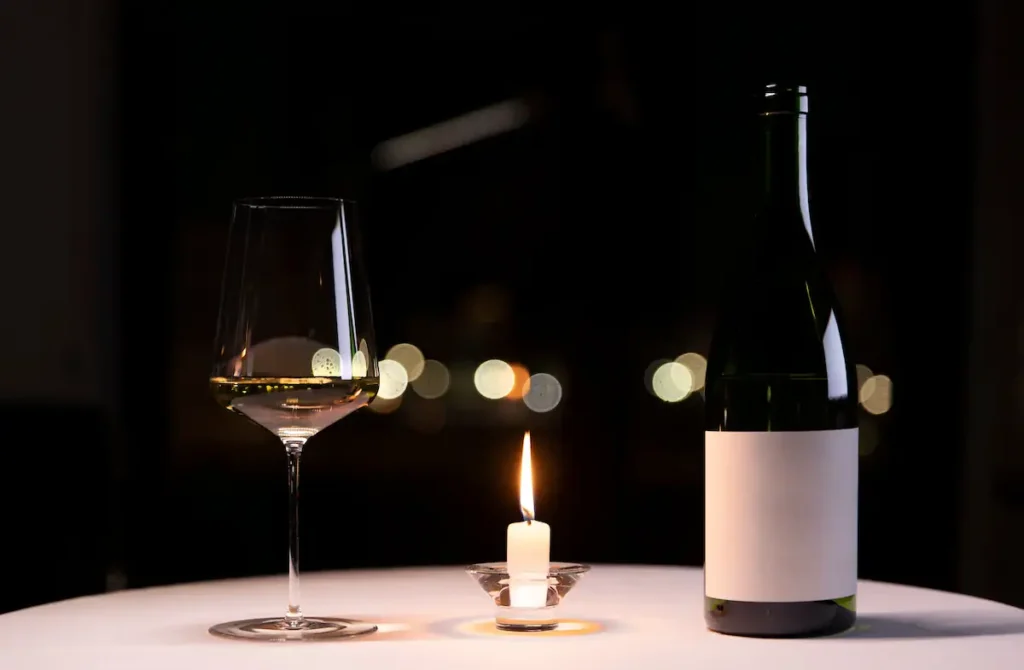 Luxury dinner date setting in West London with wine, candlelight and elegant fine dining.
